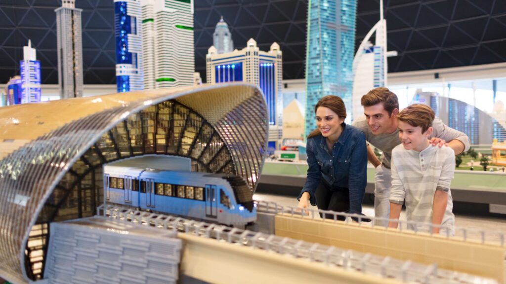 Family looking at the Legoland Dubai Metro